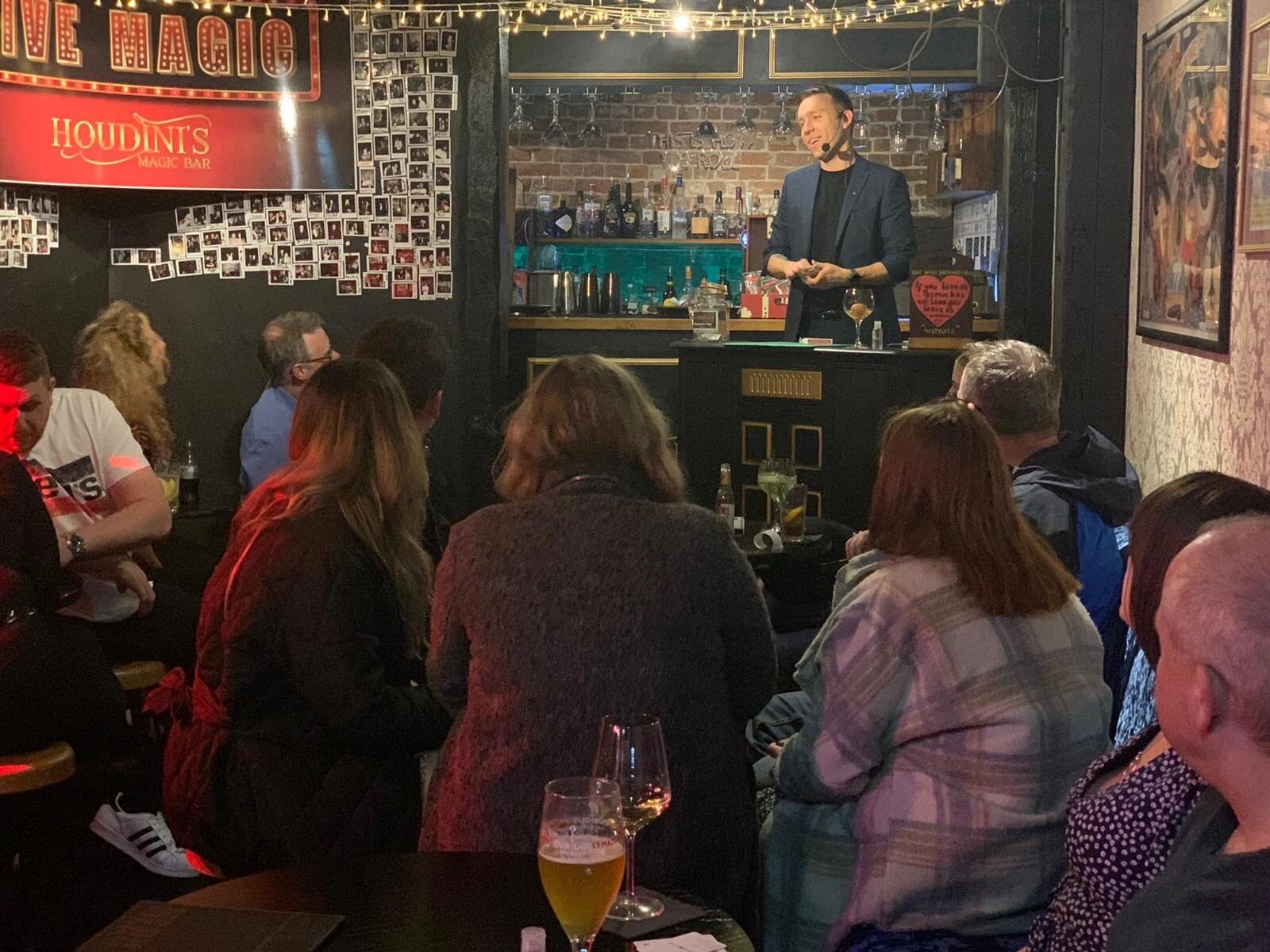 A full room at Houdini's Magic Bar watching Neil perform behind the bar